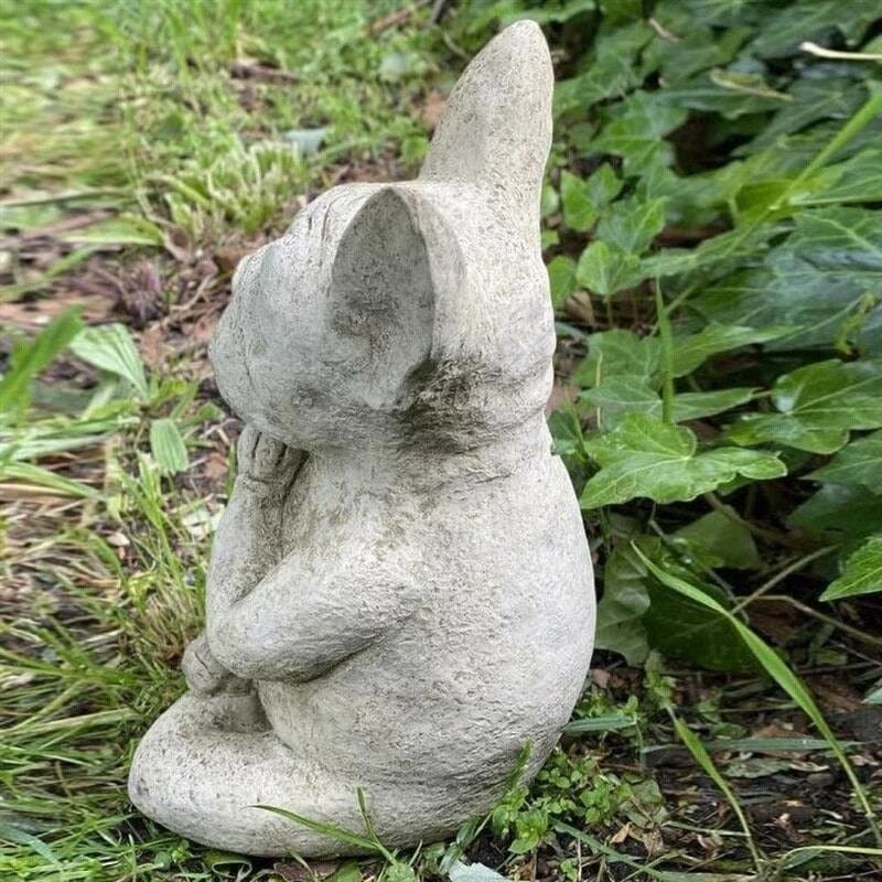 Jardioui Statue de chien position yoga